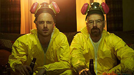 Aaron Paul and Bryan Cranston are enjoying a beer after finishing their meth cook.